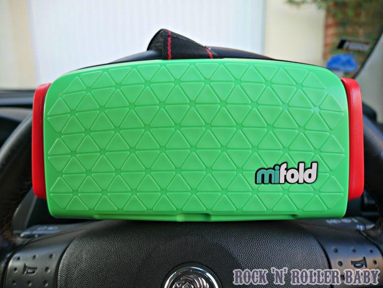 The is the seat folded up and sat on my steering wheel to give you an idea of size!